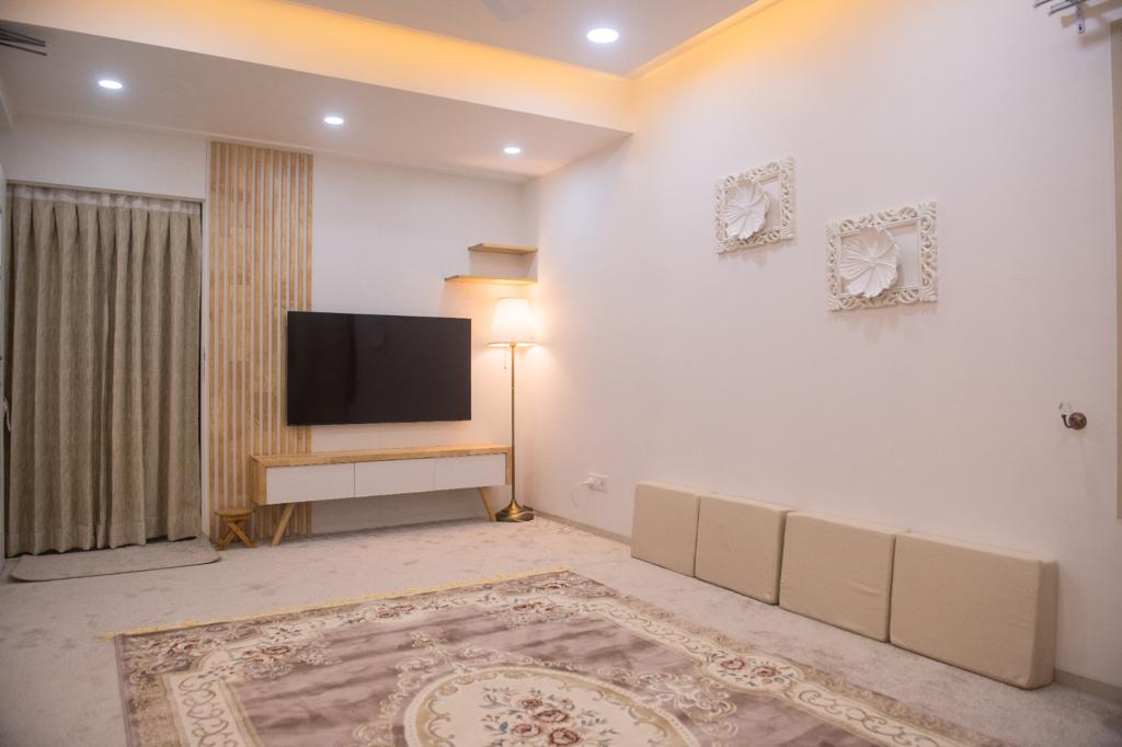 Elegant neutral living room at Seasons Apartment